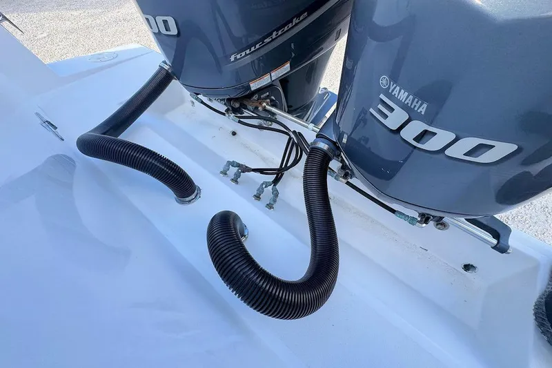 Slide: The Image of Twin Yamaha 300 engines on a 2005 Contender 35 Express Side Console boat. - 7