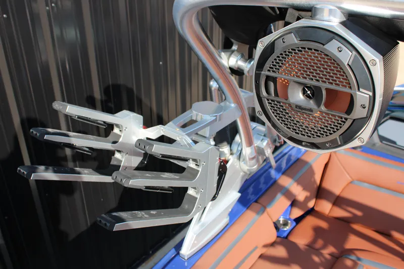 Slide: The Image of 2021 MasterCraft XStar boat with wakeboard rack and Klipsch speaker system. - 5