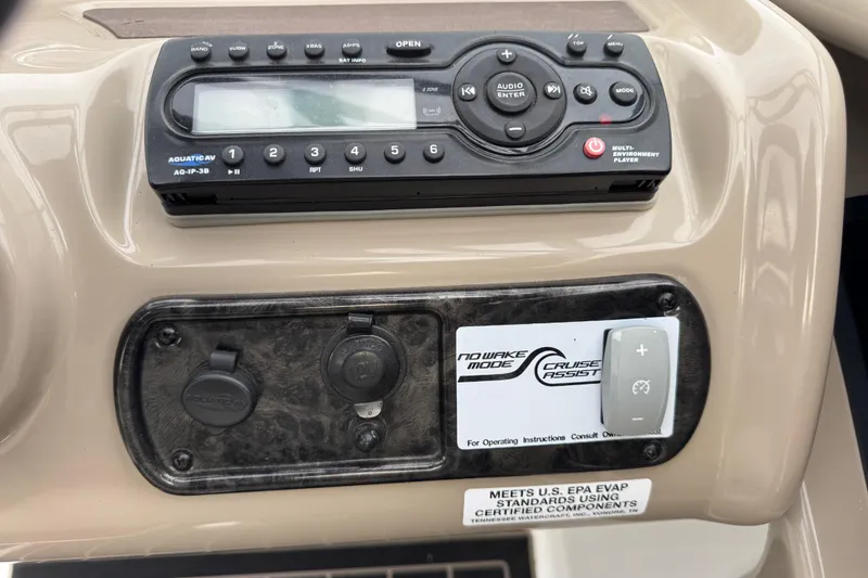 Slide: The Image of Control panel of a 2012 Yamaha Boats 242 Limited S with audio system and cruise assist. - 21