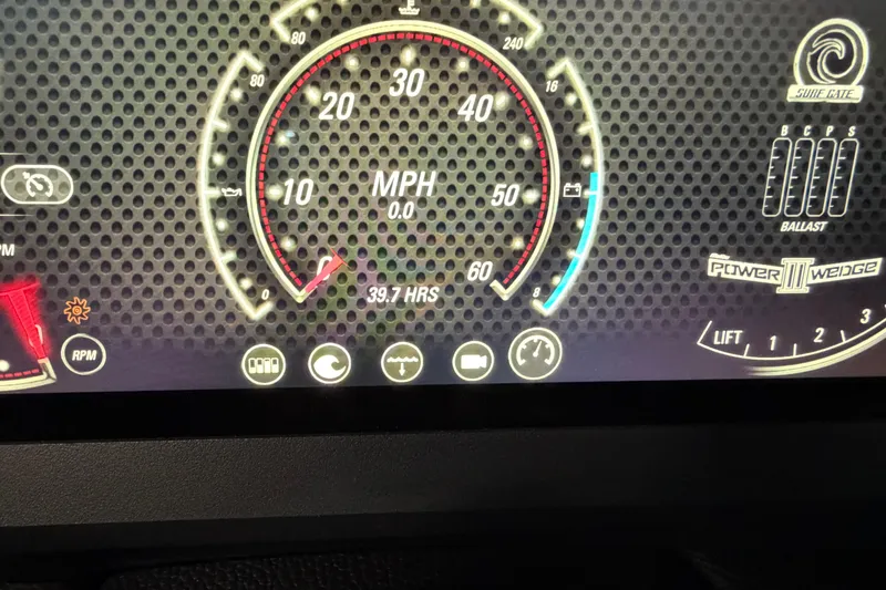 Slide: The Image of Dashboard of 2023 Malibu Wakesetter 23 LSV showing speedometer and various indicators. - 12