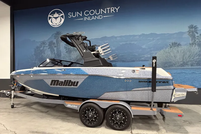 Slide: The Image of 2023 Malibu Wakesetter 23 LSV boat on trailer at Sun Country Inland showroom. - 2