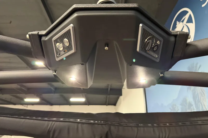 Slide: The Image of 2023 Malibu Wakesetter 23 LSV boat interior with control panel and lighting. - 23