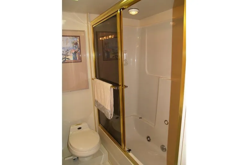 Slide: The Image of Bathroom interior of 1991 Viking 65 Cockpit yacht with shower and toilet. - 16