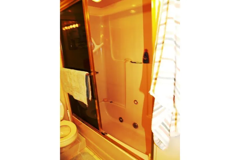 Slide: The Image of Bathroom shower area in a 1991 Viking 65 Cockpit yacht. - 22