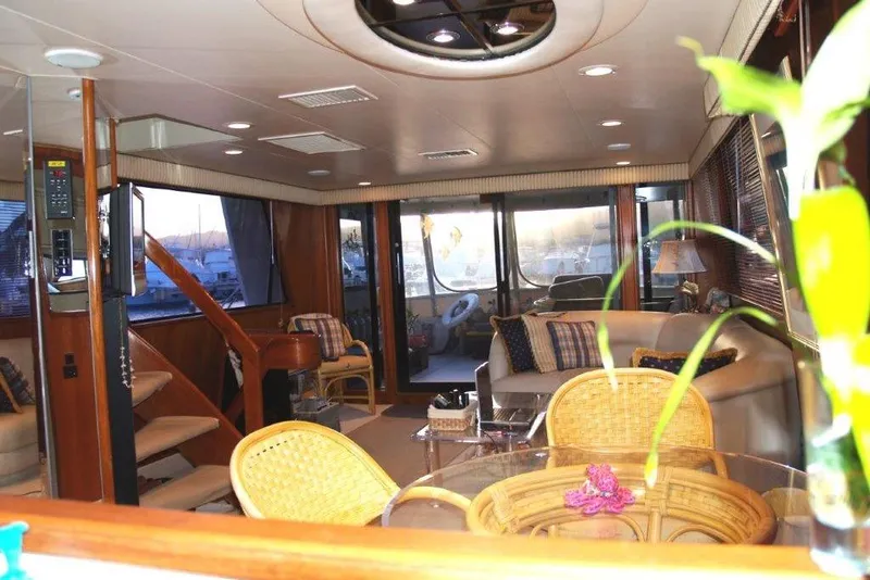 Slide: The Image of Luxurious interior of a 1991 Viking 65 Cockpit yacht with elegant furnishings. - 7