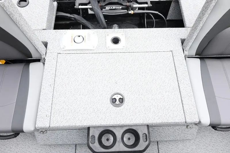 Slide: The Image of 2026 Lund 1775 Impact XS Sport boat interior with storage compartment and seating. - 40