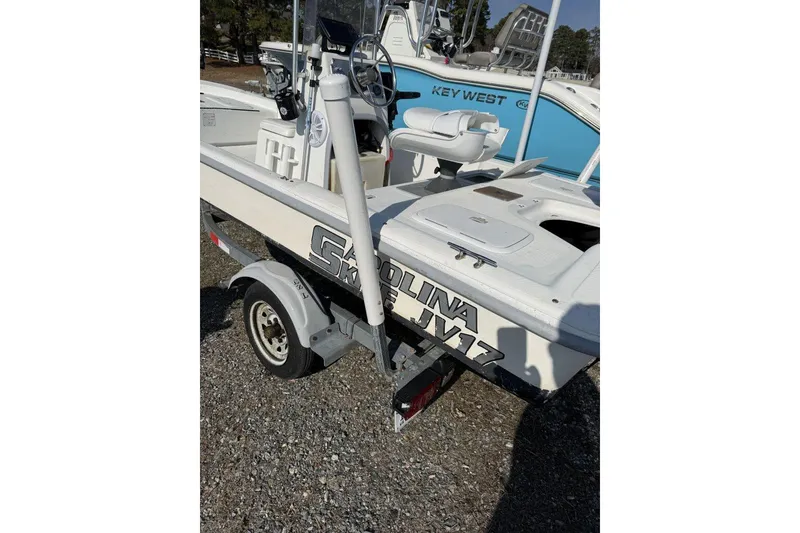 Slide: The Image of 2006 Carolina Skiff JV17 boat on trailer, parked outdoors. - 1