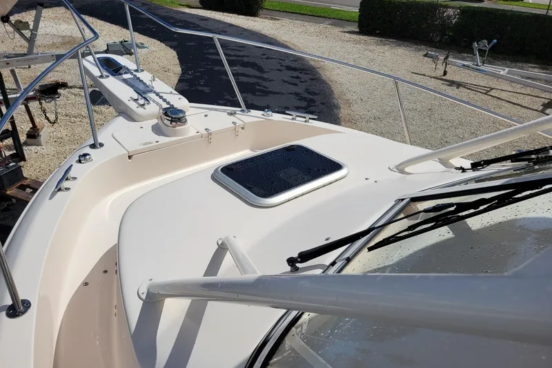 Slide: The Image of 2023 Grady-White Gulfstream 232 boat deck with anchor and hatch. - 16