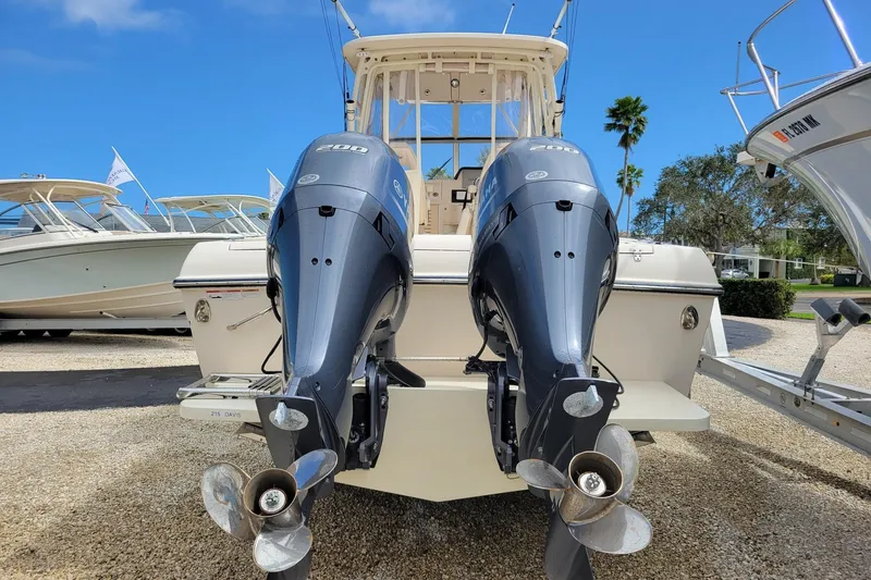 Slide: The Image of 2023 Grady-White Gulfstream 232 boat with dual Yamaha outboard engines. - 5