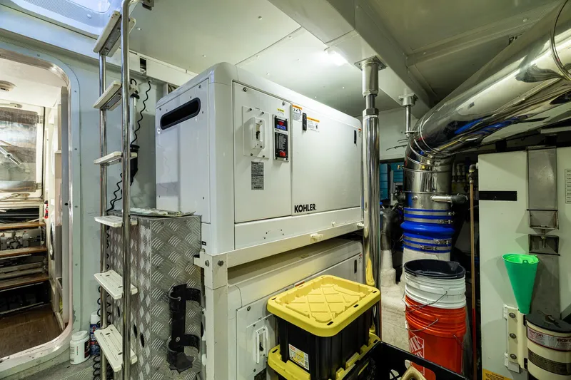 Slide: The Image of Engine room of 2015 Azimut 80 yacht with Kohler generator and storage containers. - 110