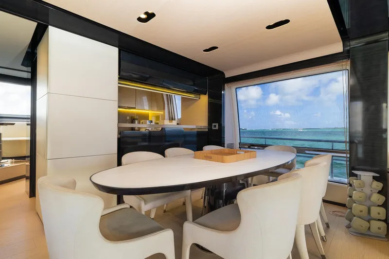 Slide: The Image of Luxurious dining area on a 2015 Azimut 80 yacht with ocean view. - 13