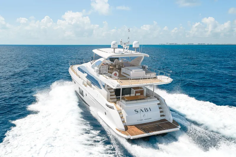 Slide: The Image of Luxurious 2015 Azimut 80 yacht cruising on open sea under clear skies. - 2