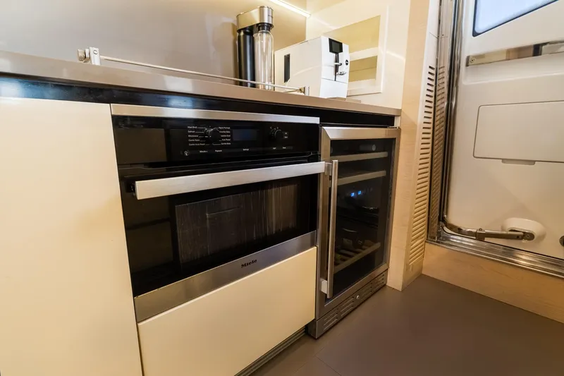 Slide: The Image of Modern kitchen appliances in a 2015 Azimut 80 yacht interior. - 21