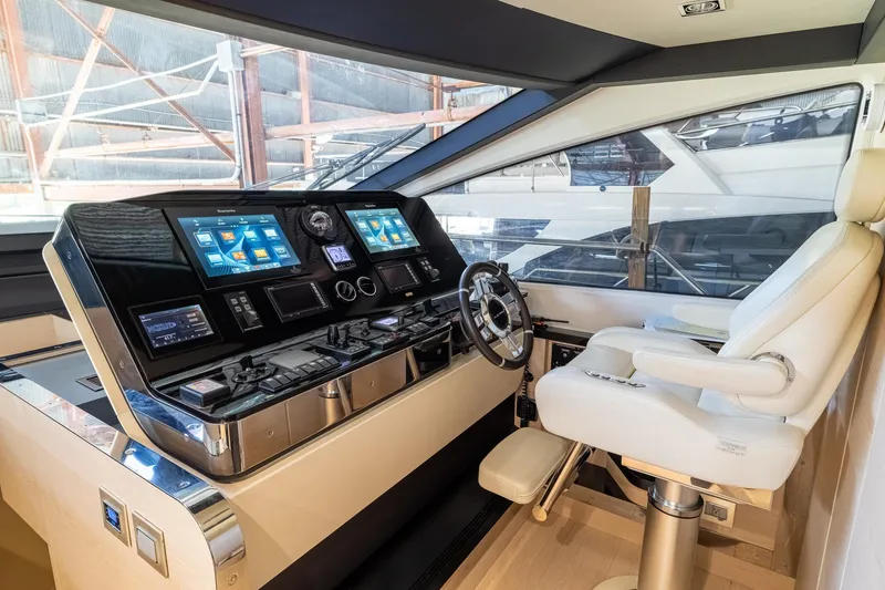 Slide: The Image of Luxurious helm station of 2015 Azimut 80 yacht with advanced navigation controls. - 23