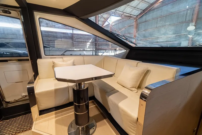 Slide: The Image of Luxurious interior seating area on a 2015 Azimut 80 yacht with modern design. - 26