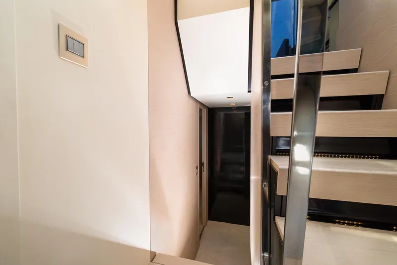 Slide: The Image of Interior staircase of 2015 Azimut 80 yacht with modern design and sleek finishes. - 31