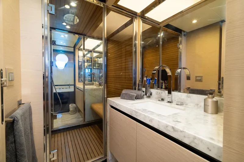 Slide: The Image of Luxurious bathroom on 2015 Azimut 80 yacht with marble sink and glass shower. - 39