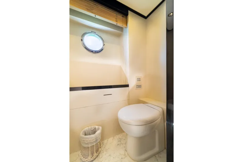 Slide: The Image of Luxurious bathroom on 2015 Azimut 80 yacht with porthole and modern fixtures. - 40