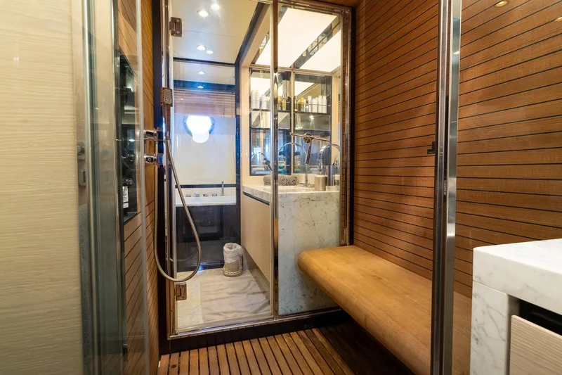Slide: The Image of Luxurious 2015 Azimut 80 yacht bathroom with wooden accents and modern fixtures. - 41