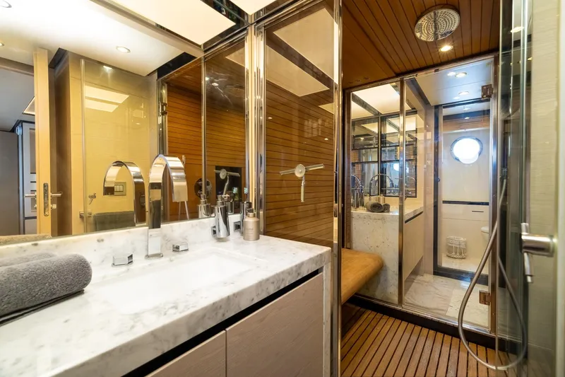Slide: The Image of Luxurious bathroom on a 2015 Azimut 80 yacht with marble sink and modern fixtures. - 42