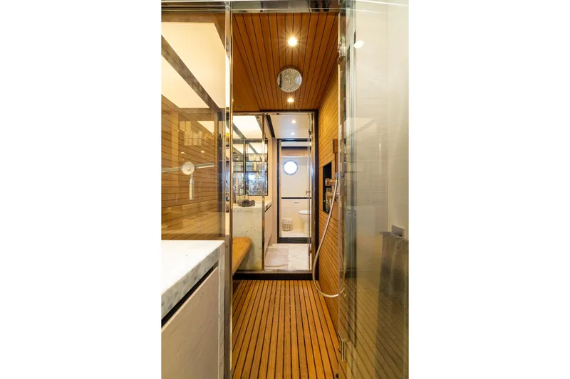 Slide: The Image of Luxurious bathroom interior of 2015 Azimut 80 yacht with wooden accents and modern fixtures. - 43