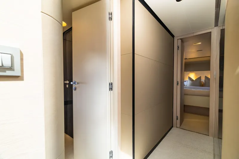 Slide: The Image of Interior hallway of a 2015 Azimut 80 yacht, leading to a cozy bedroom. - 46