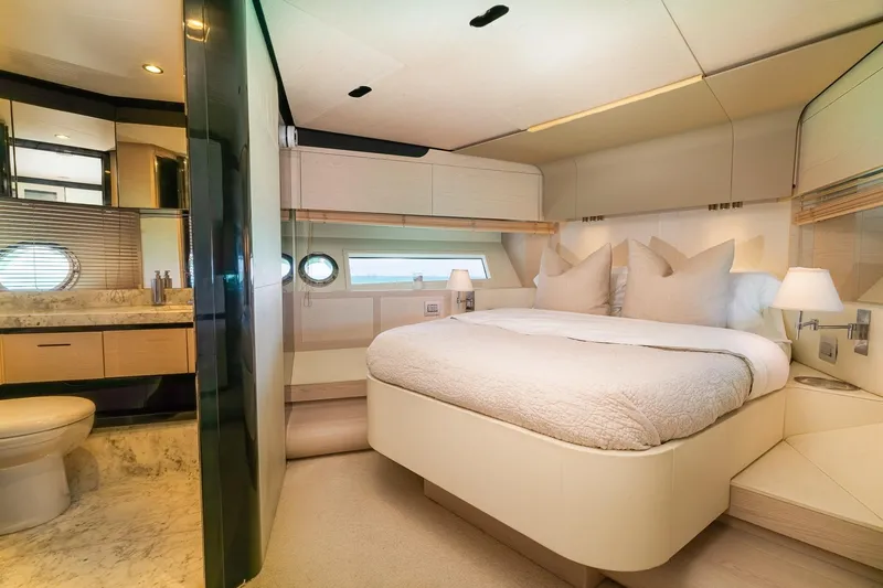 Slide: The Image of Luxurious bedroom and bathroom interior of 2015 Azimut 80 yacht, featuring elegant design and comfort. - 48