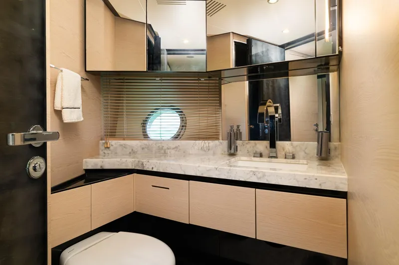 Slide: The Image of Luxurious bathroom on 2015 Azimut 80 yacht with marble countertop and modern fixtures. - 49