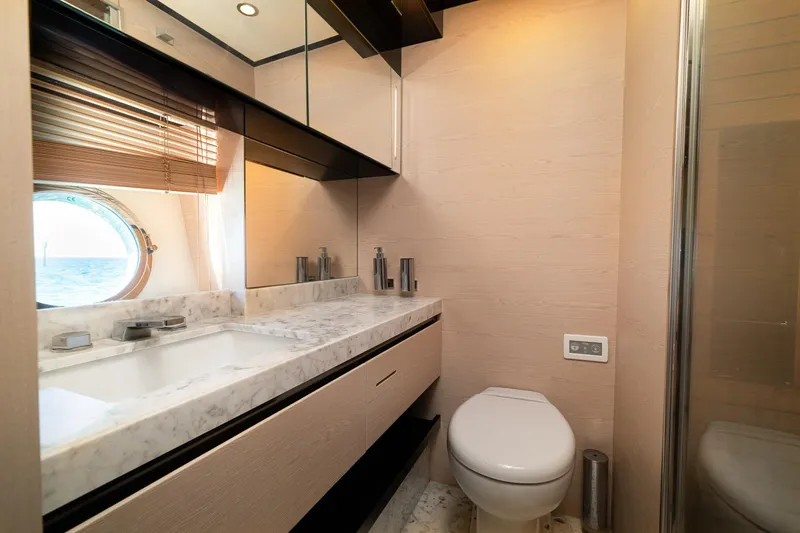 Slide: The Image of Luxurious bathroom on 2015 Azimut 80 yacht with marble countertop and ocean view. - 51