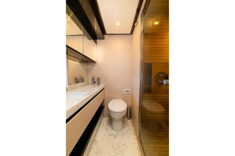 Slide: The Image of Luxurious bathroom in 2015 Azimut 80 yacht with modern fixtures and marble flooring. - 52
