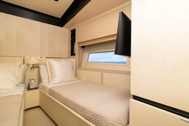 Slide: The Image of Luxurious cabin interior of 2015 Azimut 80 yacht with twin beds and window view. - 54