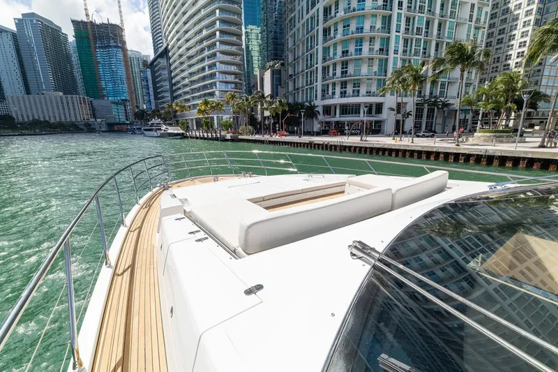 Slide: The Image of Luxurious 2015 Azimut 80 yacht cruising near modern waterfront cityscape. - 59