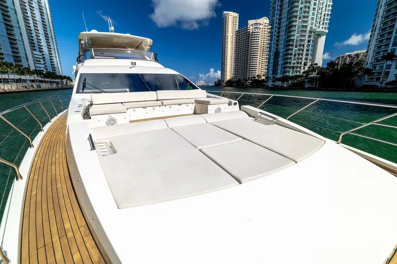 Slide: The Image of Luxurious 2015 Azimut 80 yacht cruising near modern waterfront skyscrapers. - 63