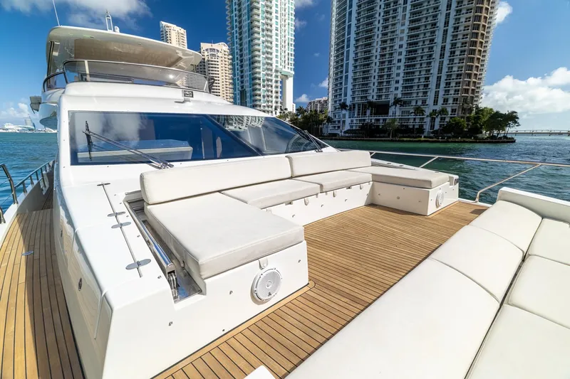 Slide: The Image of Luxurious 2015 Azimut 80 yacht with spacious deck and city skyline view. - 64