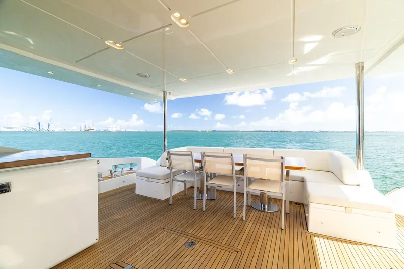 Slide: The Image of Luxurious 2015 Azimut 80 yacht deck with elegant seating and ocean view. - 7