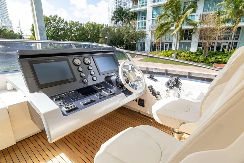 Slide: The Image of Helm of 2015 Azimut 80 yacht with modern controls and dual screens. - 78