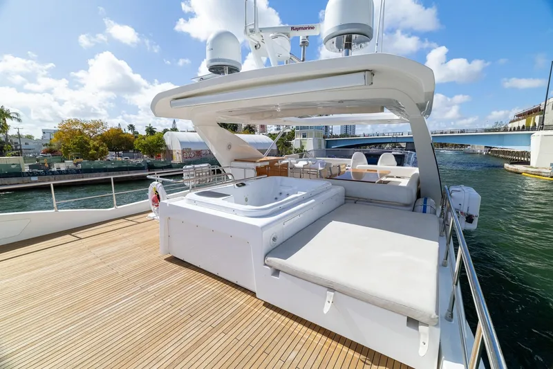 Slide: The Image of Luxurious 2015 Azimut 80 yacht deck with jacuzzi and sunbathing area. - 84
