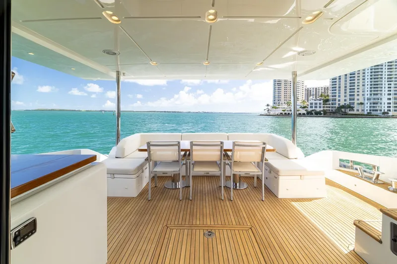Slide: The Image of Luxurious 2015 Azimut 80 yacht deck with ocean view and modern seating area. - 9
