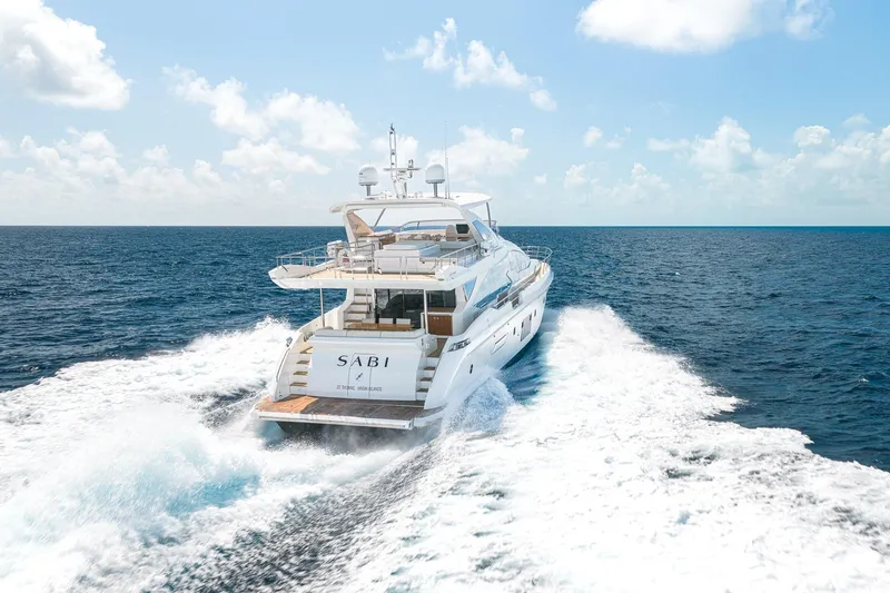 Slide: The Image of Azimut 80 yacht cruising on open sea under clear blue sky, 2015 model. - 90