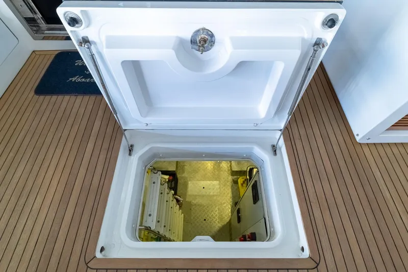Slide: The Image of Open hatch on 2015 Azimut 80 yacht, revealing interior access. - 91