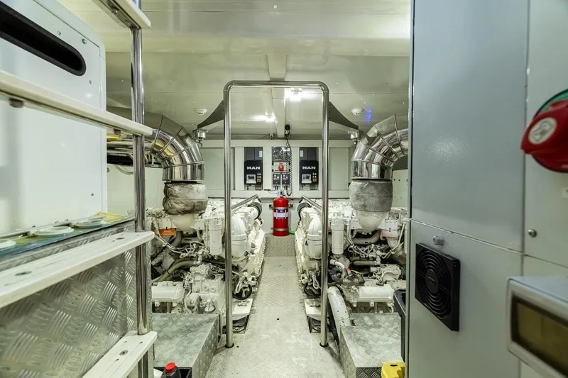 Slide: The Image of Engine room of 2015 Azimut 80 yacht with dual MAN engines and safety equipment. - 96