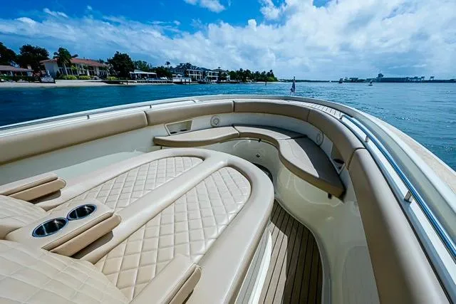 Slide: The Image of 2019 Chris-Craft Catalina 30 boat interior with luxurious seating and ocean view. - 27