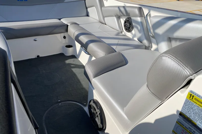 Slide: The Image of Interior of 2017 MASTERCRFAT NXT 20 boat with gray seating and speaker. - 17