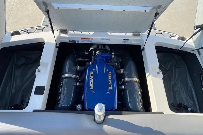 Slide: The Image of 2017 MASTERCRFAT NXT 20 boat engine compartment with Ilmor engine visible. - 18