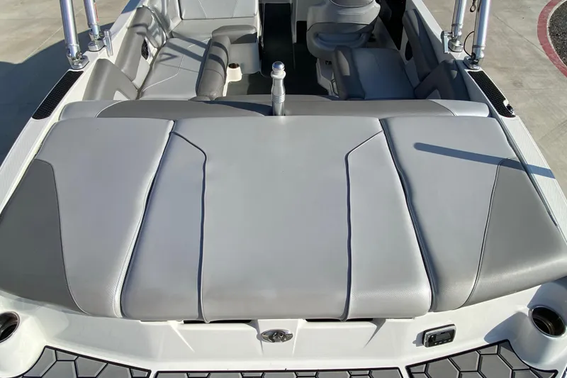 Slide: The Image of 2017 MASTERCRFAT NXT 20 boat interior with gray seating and sleek design. - 7