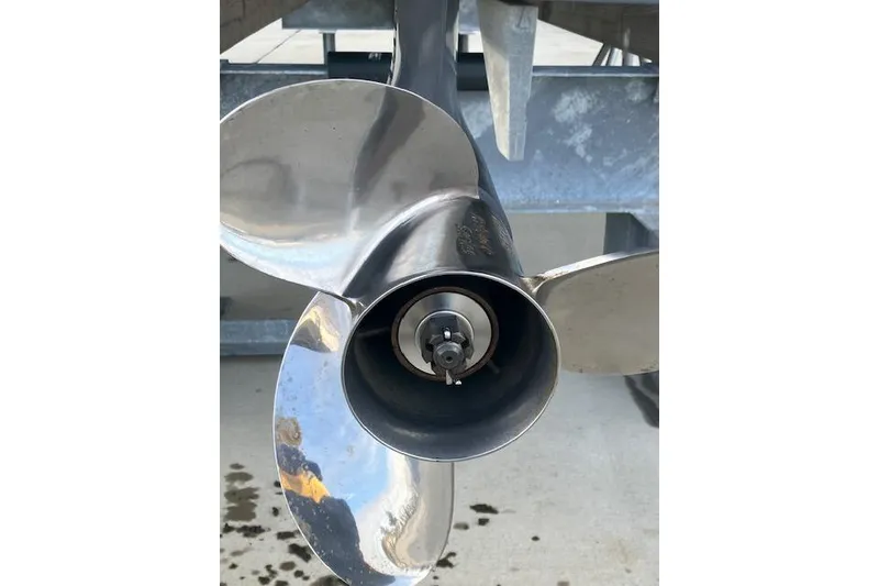 Slide: The Image of Close-up of a 2024 Sea Hunt Ultra 219 boat propeller, showcasing its sleek design. - 4
