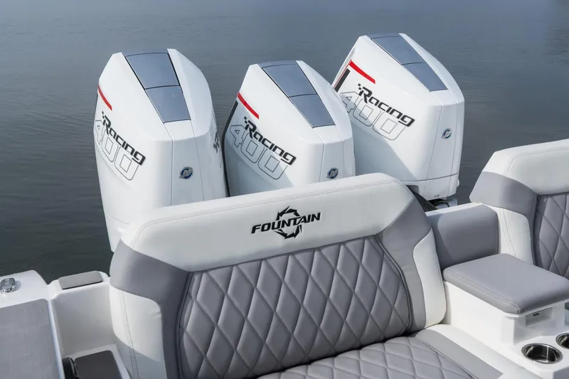 Slide: The Image of 2026 Fountain 38 SCX boat with triple Racing 400 engines, featuring luxurious seating. - 17