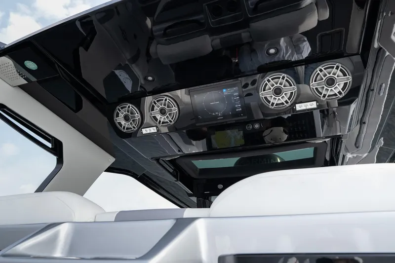 Slide: The Image of 2026 Fountain 38 SCX boat interior with advanced audio system and sleek design. - 18