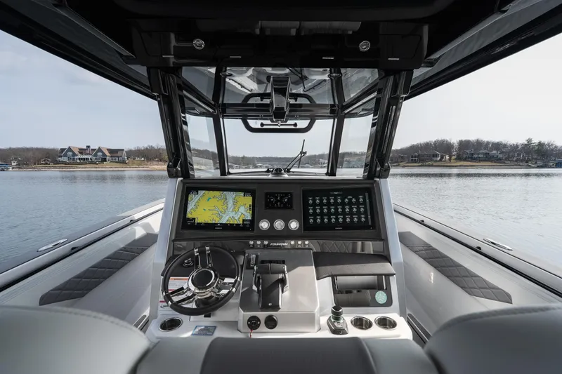 Slide: The Image of Cockpit view of 2026 Fountain 38 SCX boat with advanced navigation system. - 20