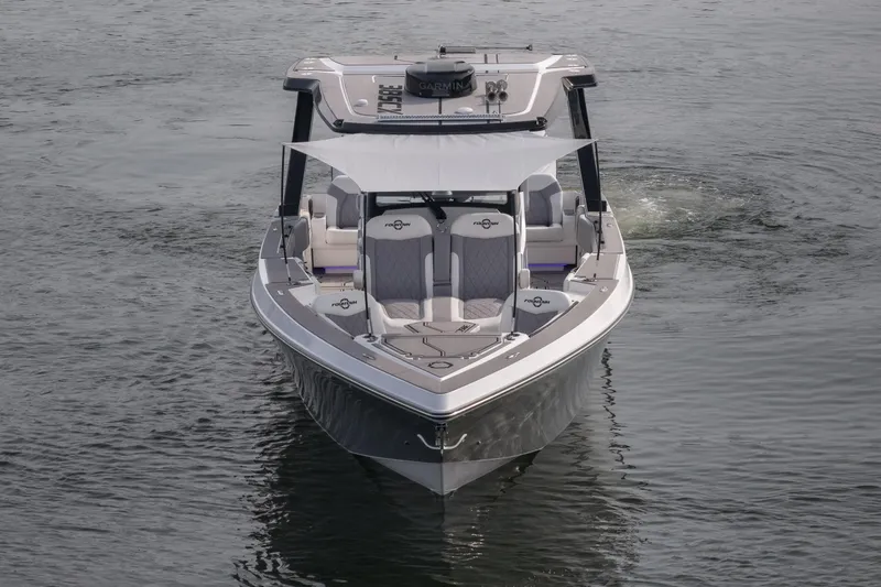 Slide: The Image of 2026 Fountain 38 SCX boat on water, showcasing sleek design and modern features. - 51
